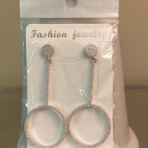Circle drop silver crystal earrings. 2 3/4 drop .